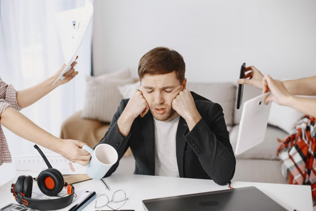 man sitting in the office and tired from work.