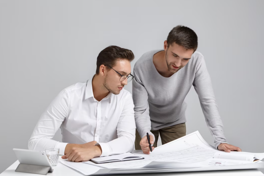 photo teamwork, job, and cooperation, picture of two colleagues in the office 